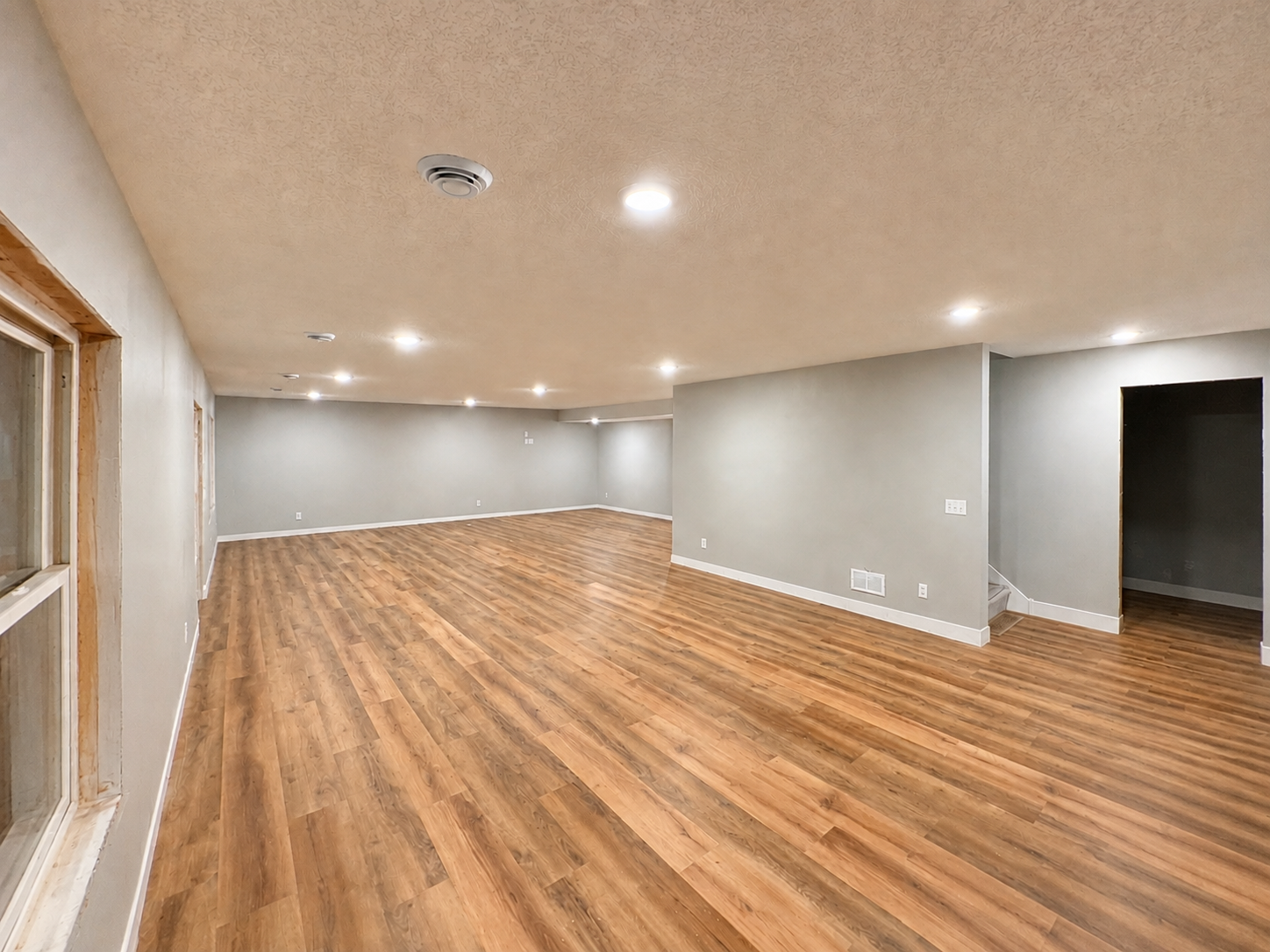 Finished empty basement living area