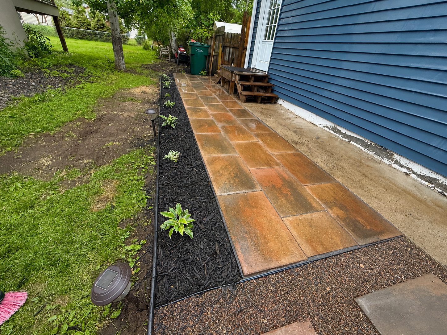 Finished paver sidewalk and planting bed